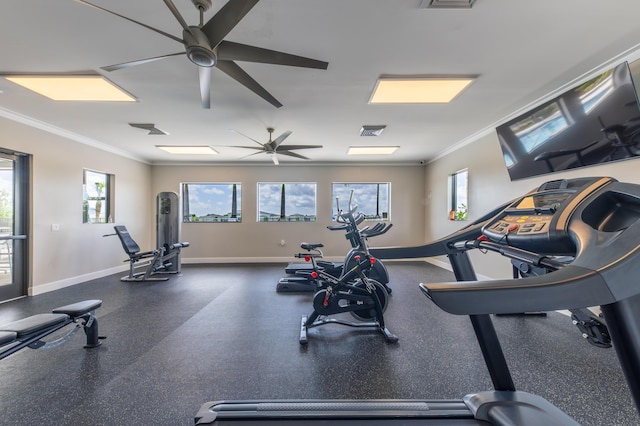 gym featuring ceiling fan and crown molding