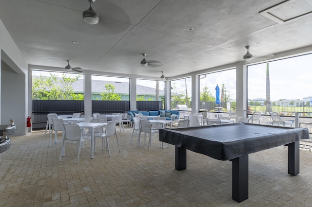 playroom with ceiling fan, billiards, and a healthy amount of sunlight