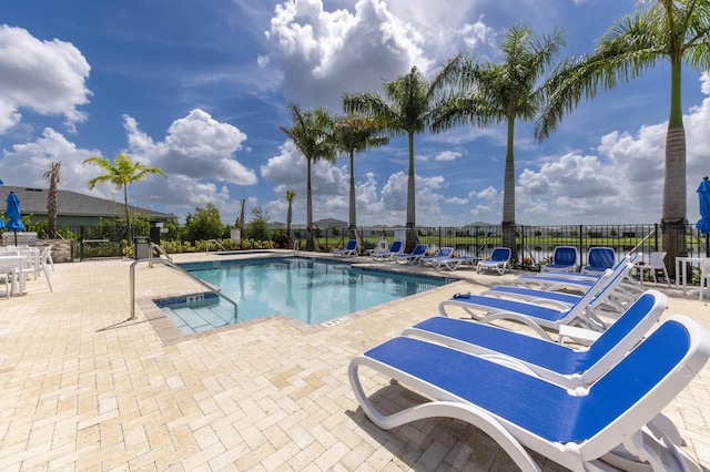 view of pool featuring a patio area