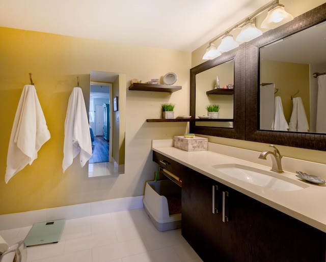 bathroom featuring tile patterned floors and vanity