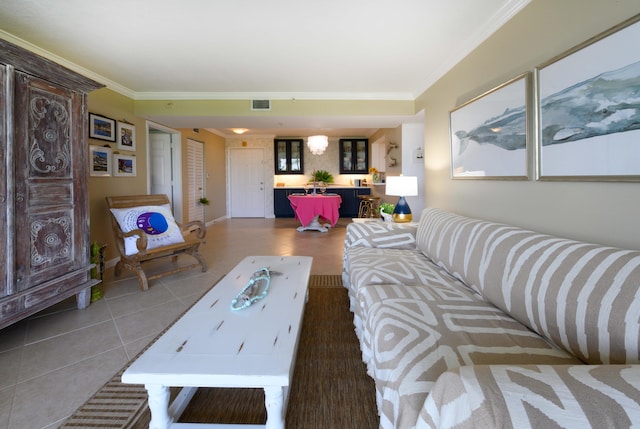 tiled living room featuring crown molding