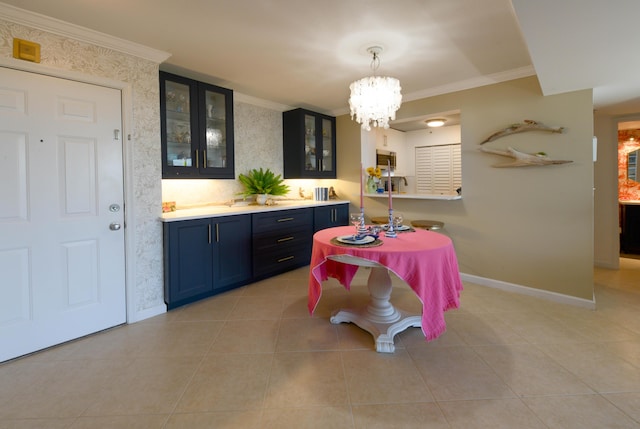 tiled dining space with a chandelier and ornamental molding