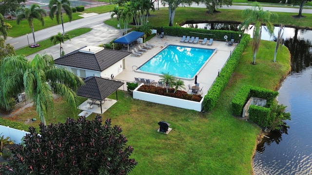 birds eye view of property featuring a water view