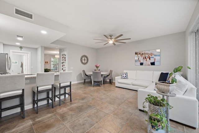 living room with ceiling fan