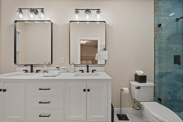 bathroom with walk in shower, vanity, and toilet