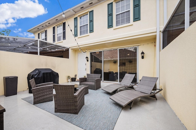 view of patio featuring area for grilling and an outdoor hangout area