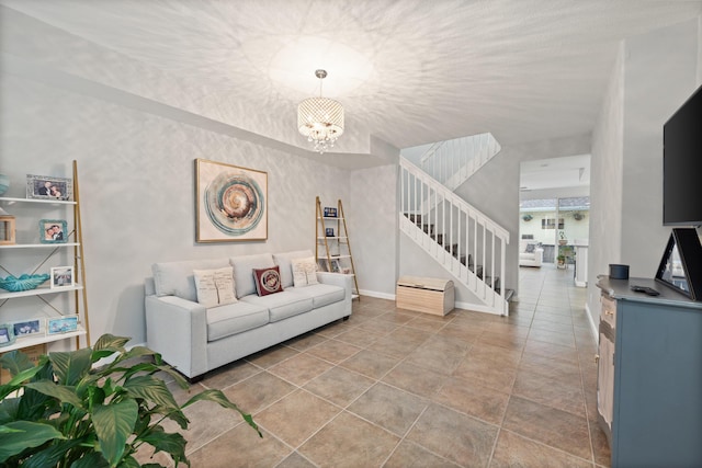 living room featuring a chandelier