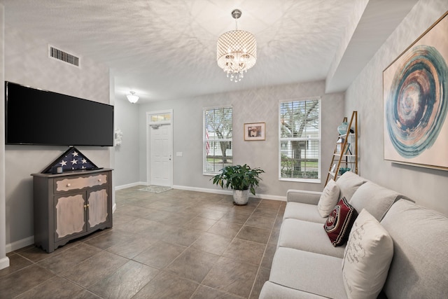 living room featuring an inviting chandelier