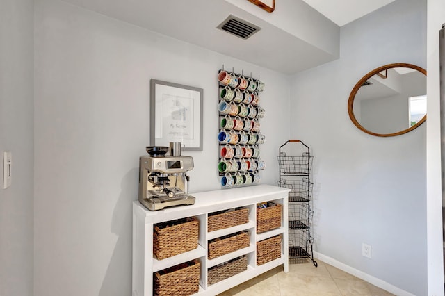 interior space with light tile patterned floors