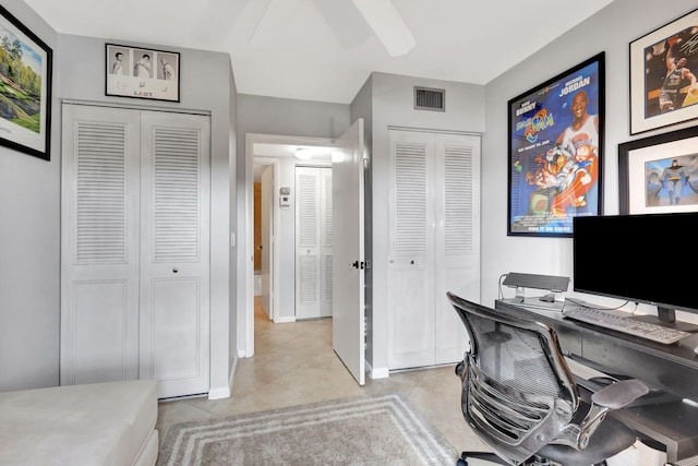 office area with light tile patterned floors