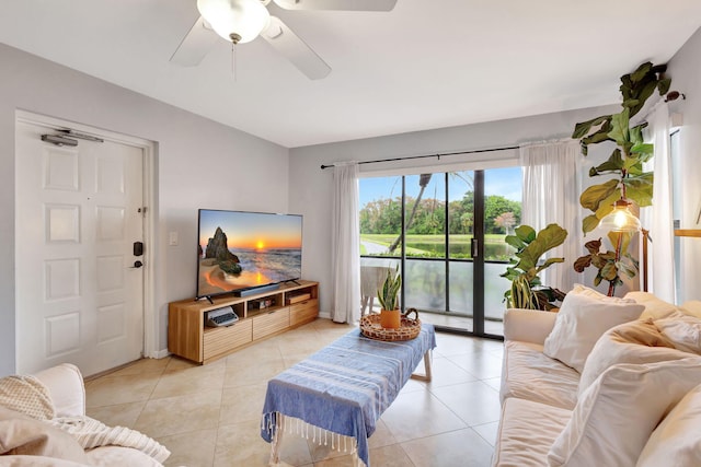 tiled living room with ceiling fan