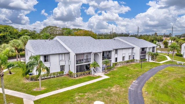 exterior space featuring a front lawn