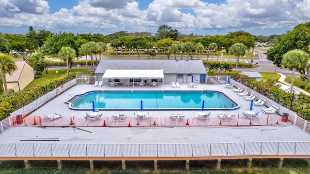 view of swimming pool with a patio