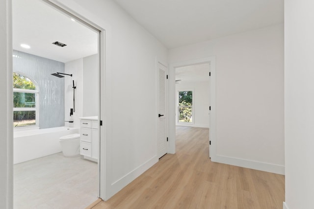 hallway featuring light hardwood / wood-style floors