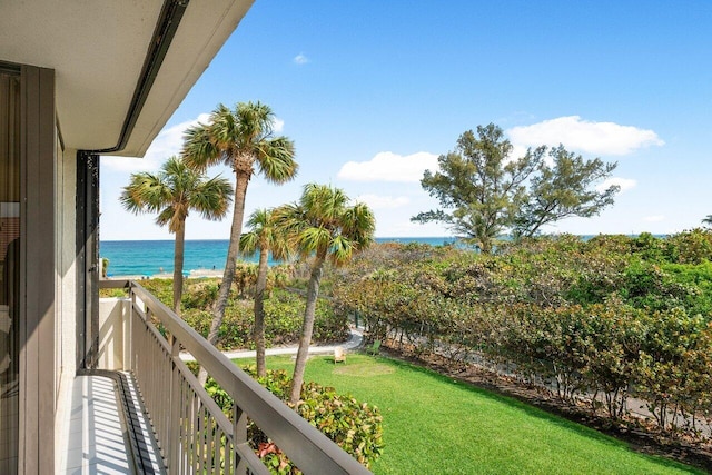 balcony featuring a water view