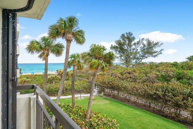 balcony featuring a water view