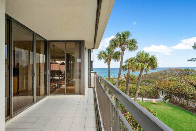 balcony featuring a water view