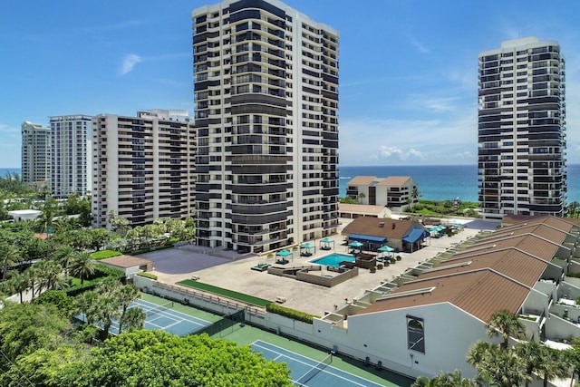 view of building exterior with a water view