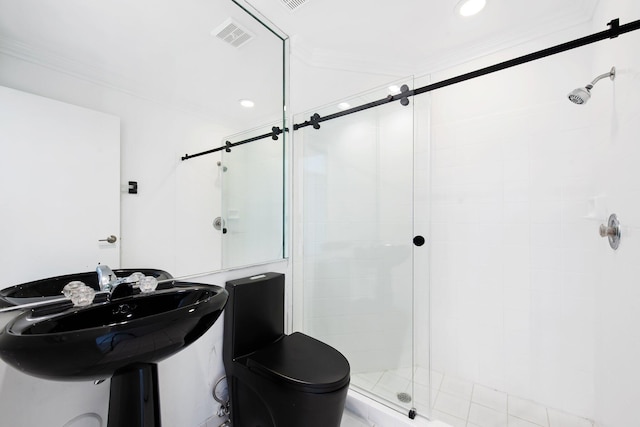 bathroom with crown molding, toilet, and walk in shower