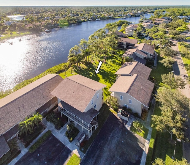 bird's eye view with a water view