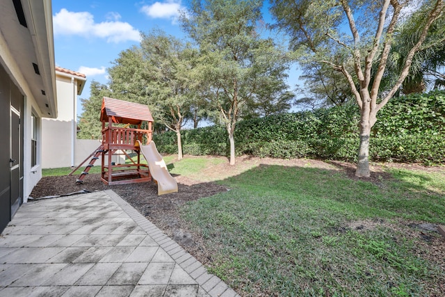 view of yard featuring a playground