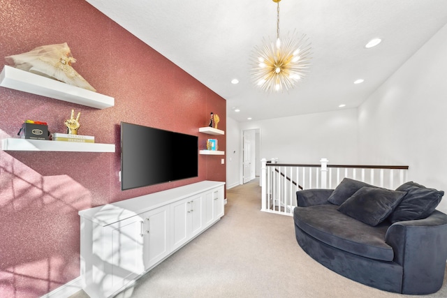 living room with light carpet and a notable chandelier