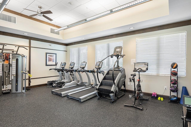 exercise room with ceiling fan