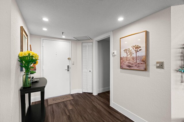 entrance foyer featuring dark hardwood / wood-style floors