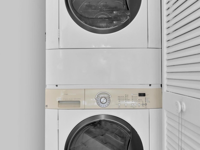 laundry area featuring stacked washer and dryer