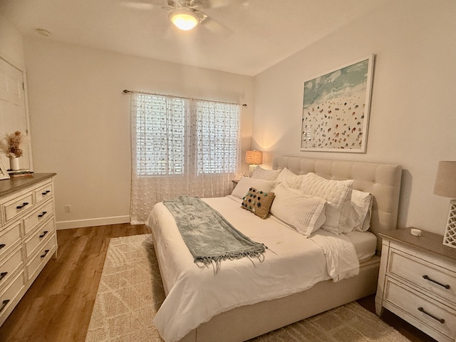 3289 Wymberly Dr, Jupiter, FL 33458 - bedroom featuring dark wood finished floors, baseboards, and a ceiling fan