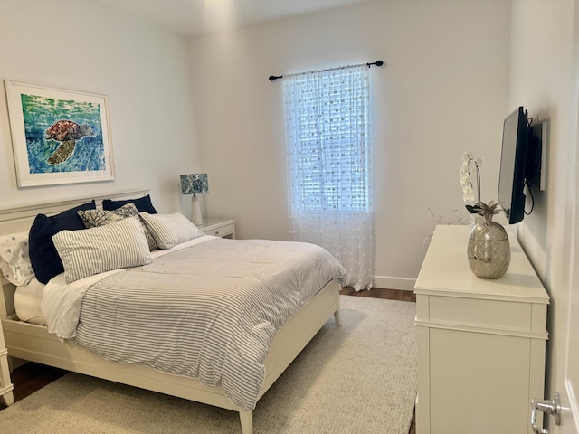 bedroom featuring hardwood / wood-style flooring