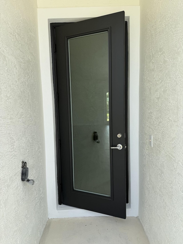 14042 82nd St N, The Acreage, FL 33470 - property entrance featuring stucco siding