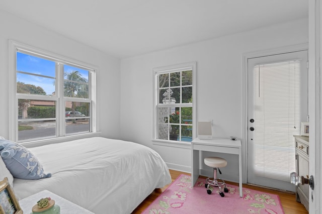 bedroom with light wood-type flooring