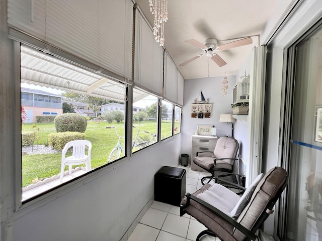 sunroom with ceiling fan