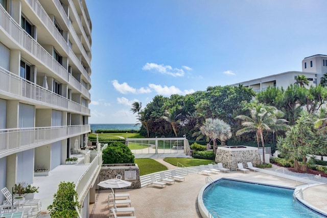 view of pool featuring a patio