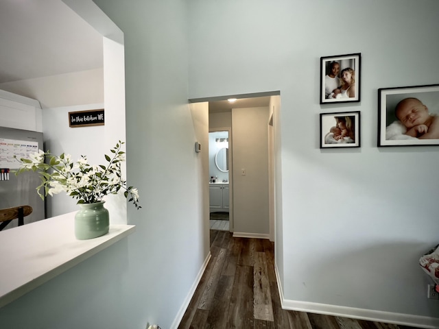 hallway featuring dark wood-type flooring