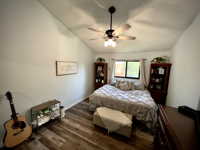 bedroom with dark hardwood / wood-style floors and ceiling fan