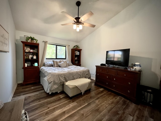 bedroom featuring ceiling fan, lofted ceiling, and dark hardwood / wood-style flooring