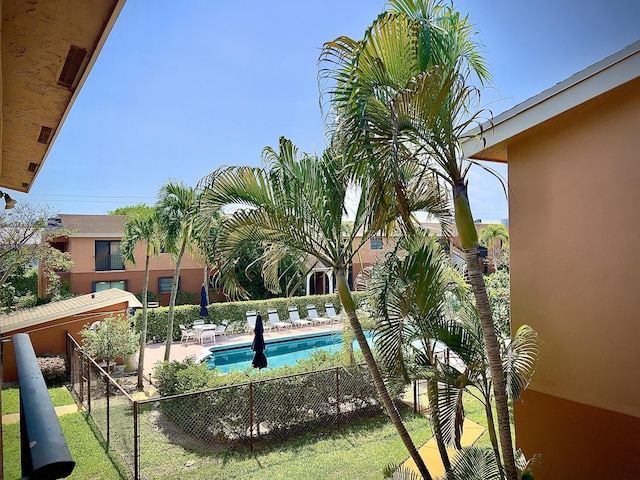 view of swimming pool featuring a patio area