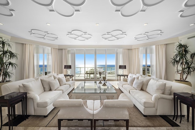 living room with crown molding and floor to ceiling windows