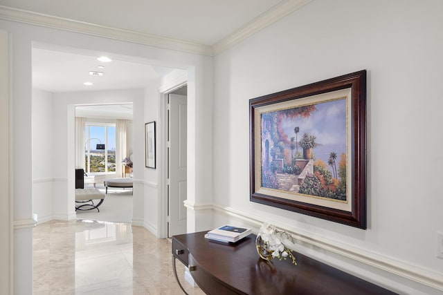 hallway featuring ornamental molding