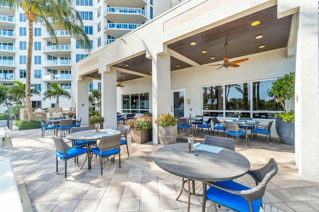 view of patio featuring ceiling fan