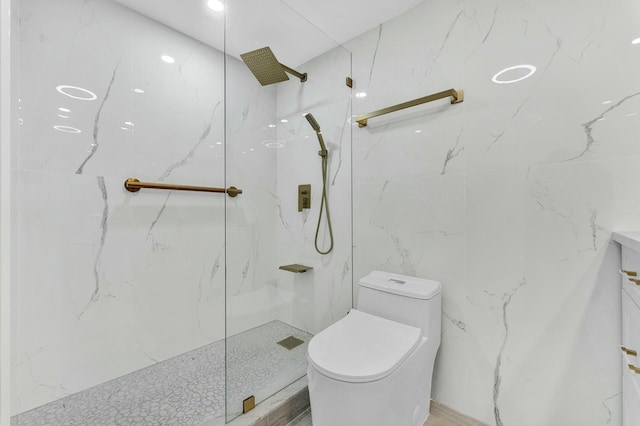 bathroom featuring toilet and tiled shower