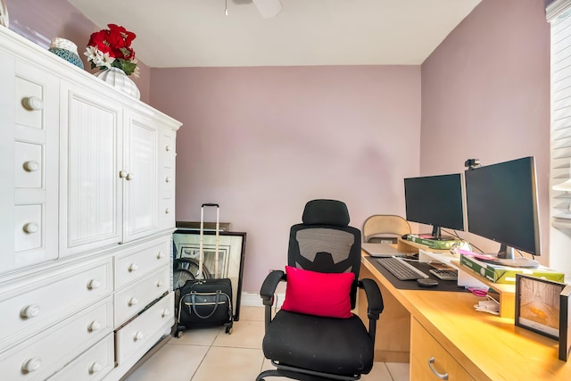 office with ceiling fan and light tile patterned floors