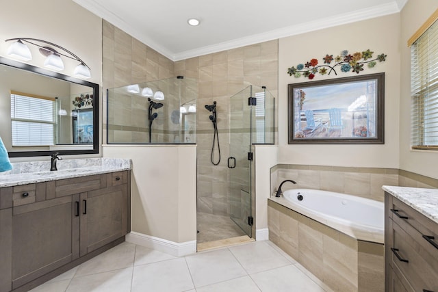 bathroom with vanity, ornamental molding, and separate shower and tub