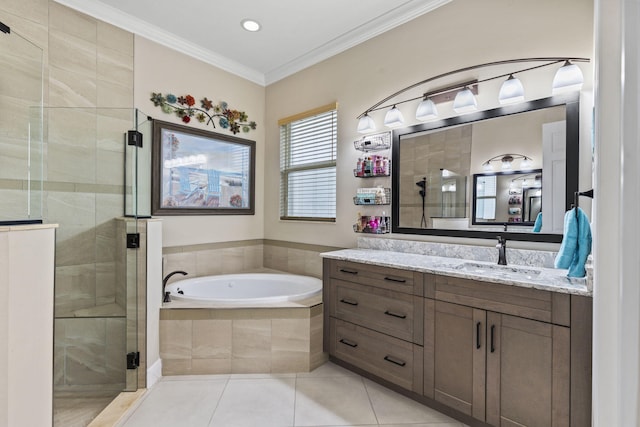 bathroom featuring crown molding, separate shower and tub, tile patterned floors, and vanity