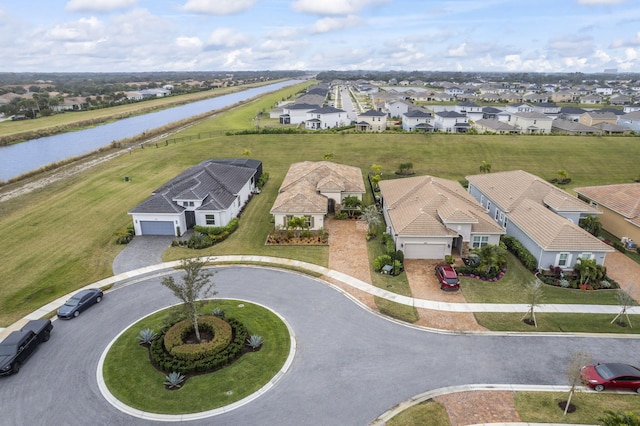 bird's eye view with a water view