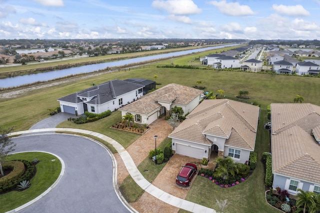 birds eye view of property featuring a water view