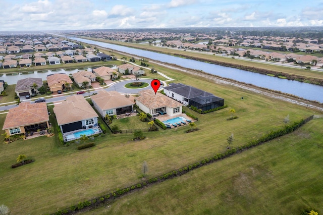 drone / aerial view with a water view