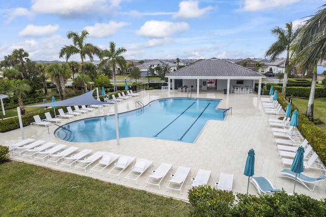 view of swimming pool with a patio